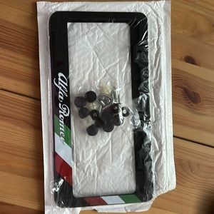 Brand new ALFA ROMEO plates holders front and back included